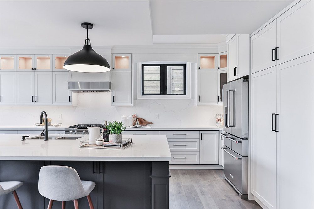 high-end kitchen with all custom cabinets and oversized island