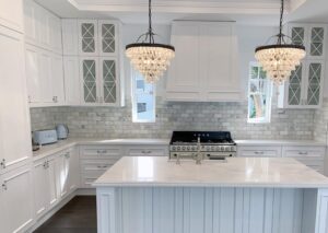 Crystal pendary lights in Castle Hill Hamptons kitchen renovation