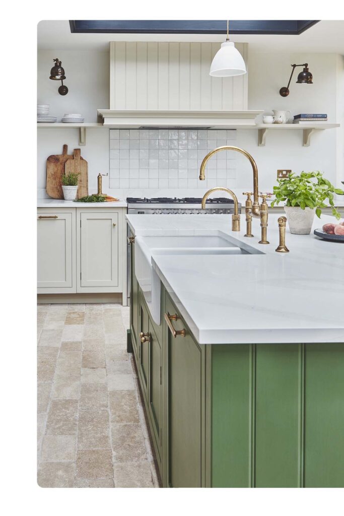 North Shore kitchen renovation featuring green shaker island, marble benchtop, and brass tapware.