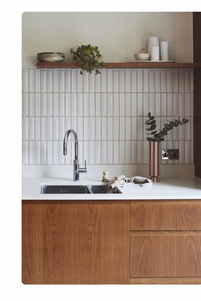 Contemporary tiled kitchen splashback Sydney with oak cabinetry and white benchtop by Badel Kitchens
