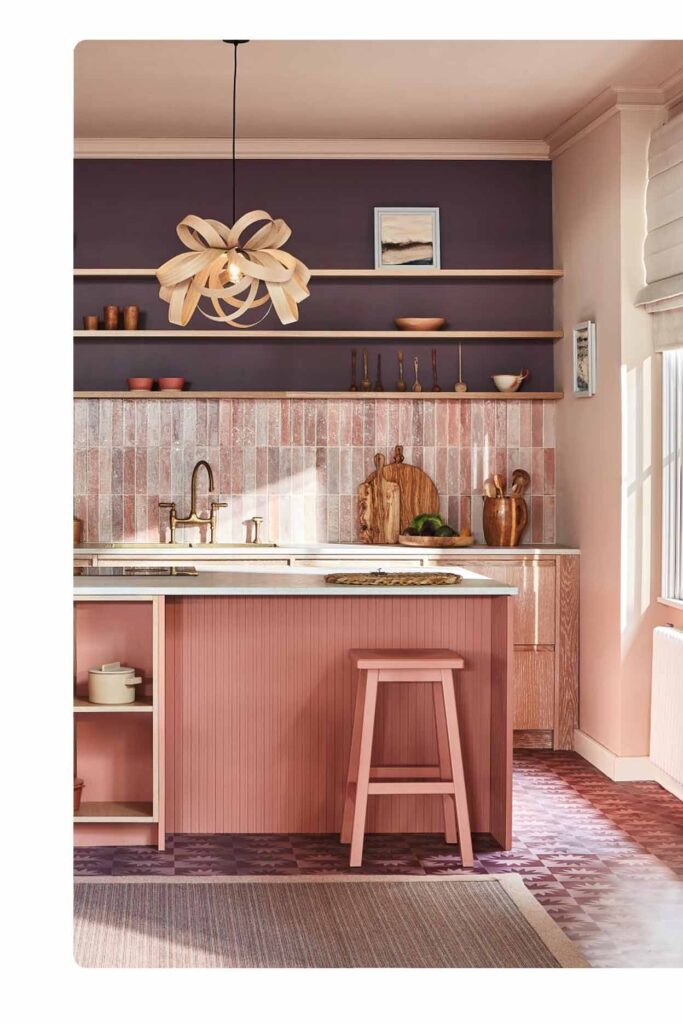 Modern pink tiled kitchen splashback with open shelving and brass fittings by Badel Kitchens Sydney